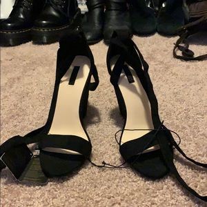 New worn black lace up wedges